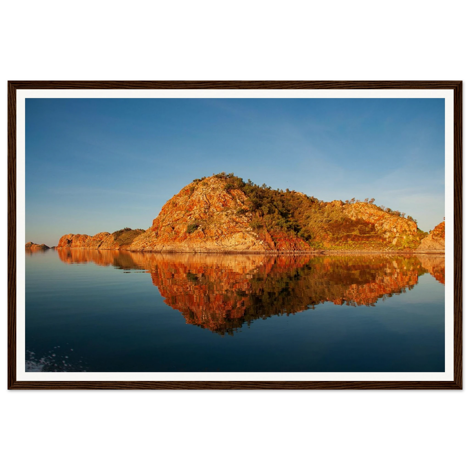 Golden Hour Mirror — Island Reflections, Lake Argyle. Fine-art photograph of golden-hour island reflections in the mirror-still surface of Lake Argyle, East Kimberley region of Western Australia. Framed wooden poster · Made-to-order · Free Australia-wide shipping. — Two Fat Bunnies.