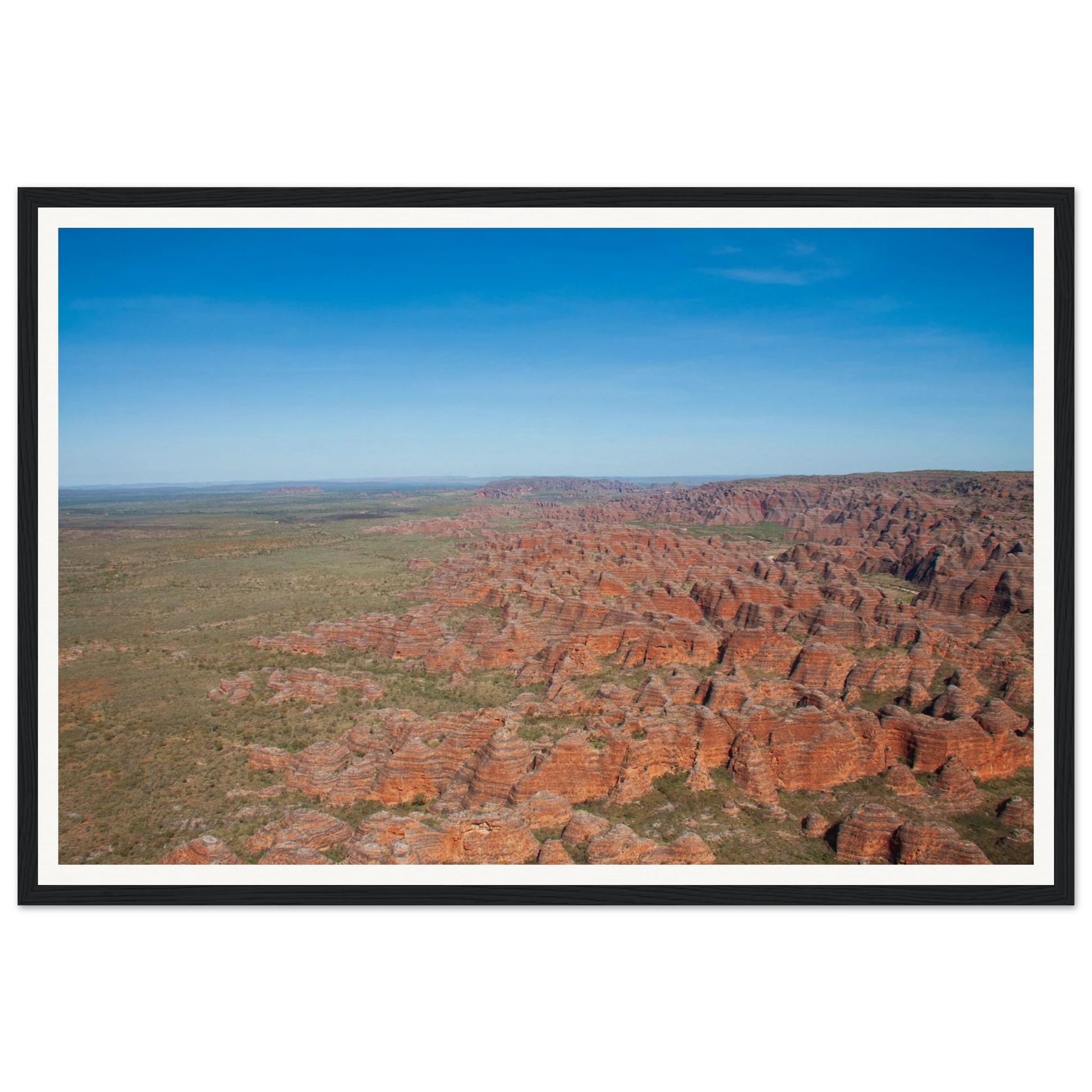 Over the Bungle Bungles - Aerial Landscape Print. Fine-art aerial photograph captured flying over the iconic striped beehive sandstone domes of the Bungle Bungle range, Purnululu National Park, Western Australia. Framed wooden poster · Made-to-order · Free Australia-wide shipping. — Two Fat Bunnies.