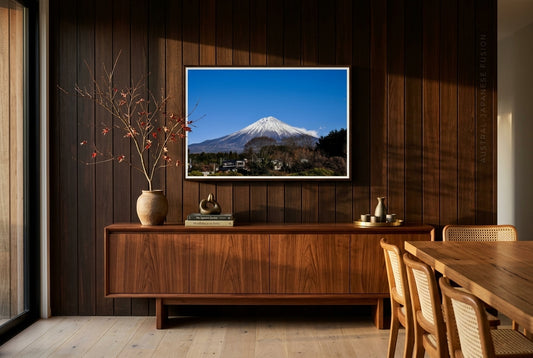 Majestic Mount Fuji, framed above a low cedar dining sideboard in an Australian-Japanese fusion dining room — cedar feature wall, ikebana Japanese maple, brass sake set, dark wood frame. — Two Fat Bunnies.