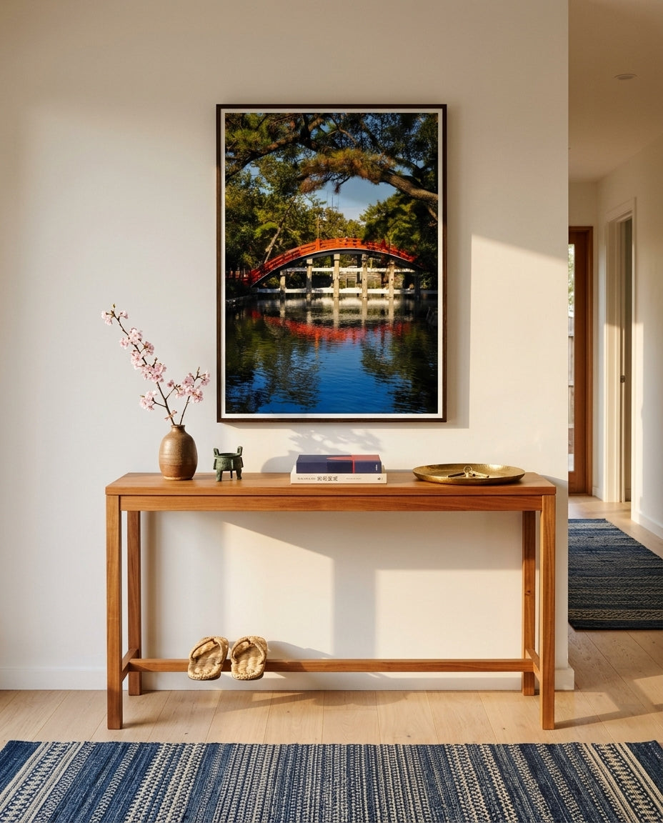 Sumiyoshi Taisha Bridge – Vibrant Japanese Shrine Art, framed above a slim oak console in a Japandi entry hall — woven cane tray, ceramic vessel, sprig of greenery, paper-shaded lamp, dark wood frame. — Two Fat Bunnies.