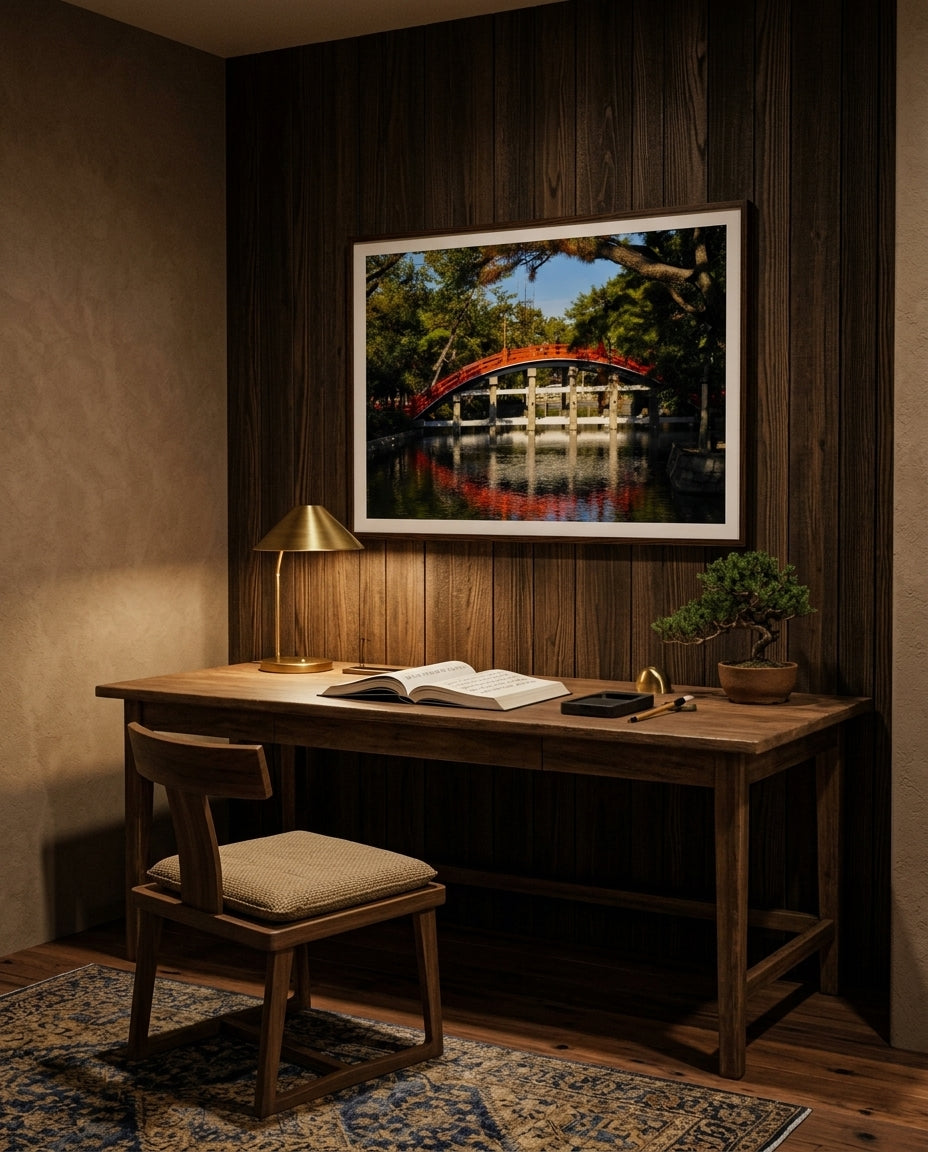 Sumiyoshi Taisha Bridge – Vibrant Japanese Shrine Art, framed above an aged walnut writing desk in a scholar's study — bonsai juniper, brass reading lamp, leather-bound books, ink stone, dark wood frame. — Two Fat Bunnies.